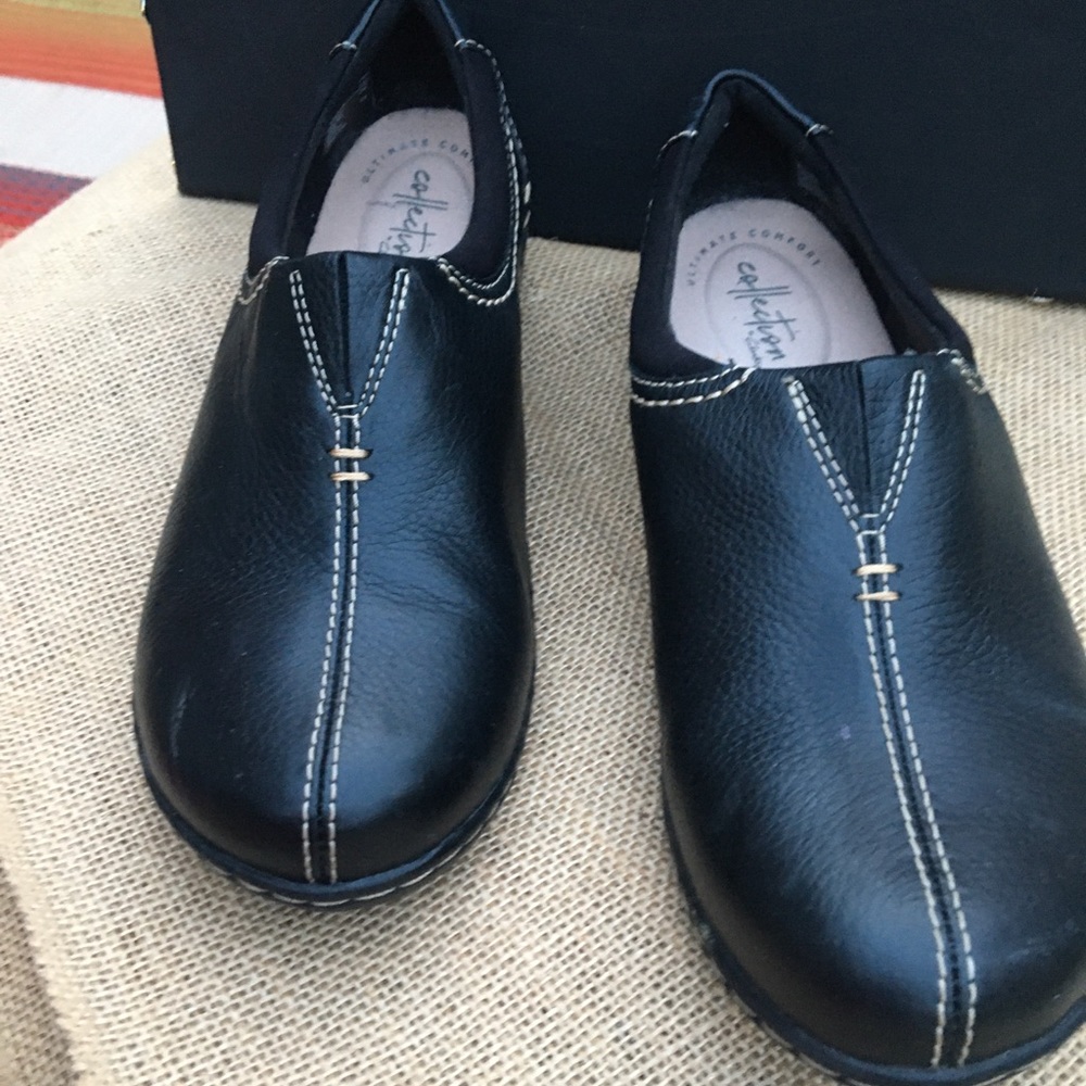 Clark’s black slip on shoes